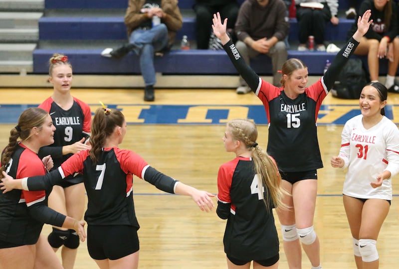 Members of the Earlville volleyball team react after defeating Leland during the Class 1A Regional semifinals on Monday, Oct. 27, 2025 at Somonauk High School.
