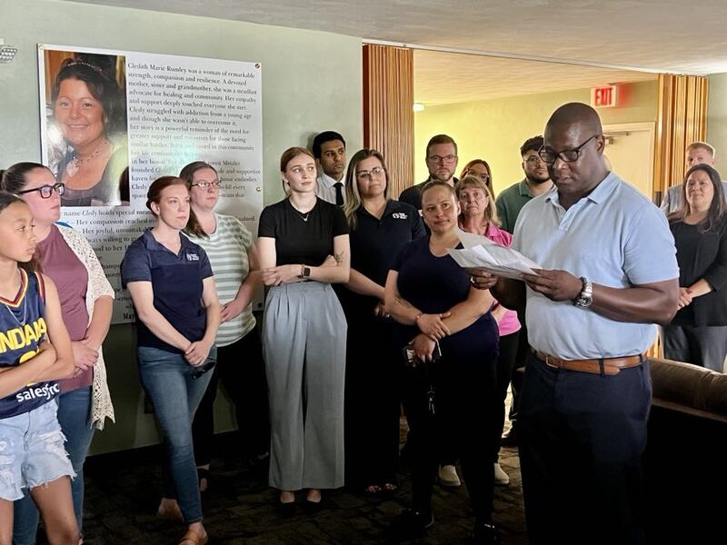 Sauk Valley Voices of Recovery's Executive Director Gerald Lott addresses the crowd at Cledy's House of Hope, a new women's sober living facility in Rock Falls.
