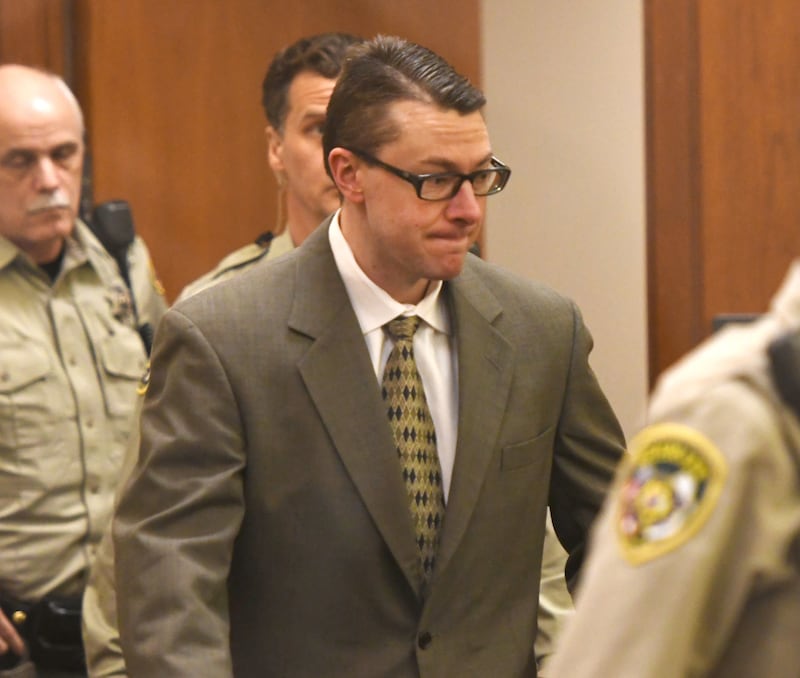 Duane "DC" Meyer walks to his defense table on Thursday, Jan. 29, 2026 just minutes before jurors found him guilty of killing his ex-wife and 3-year-old son in 2016.