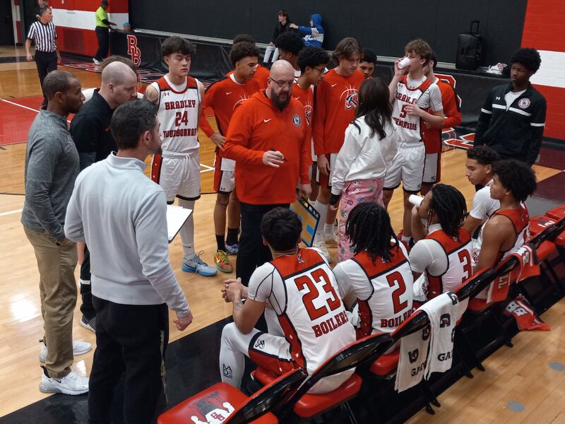 Bradley-Bourbonnais head coach Eric Long addresses his team during a fourth-quarter timeout in a 56-41 home loss to Don Bosco Prep on Dec. 12, 2025.