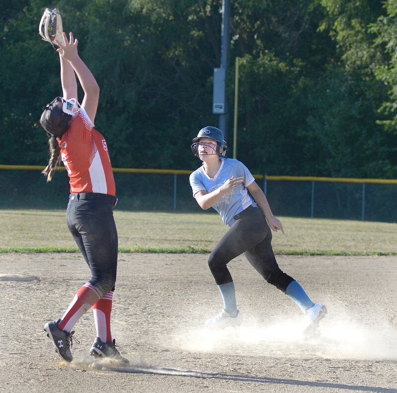 Streator DQ Scarlett Lesak catches an infield pop up as Streator Blue Lexi Davies gets back to 2nd base Wednesday at Bodznick Park in Streator.