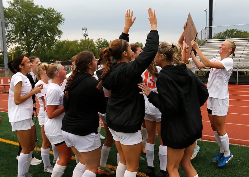 Crystal Lake Central players celebrate defeating St. Viator in the IHSA Class 2A Deerfield Sectional championship girls soccer match on Friday, May 30, 2025, at Deerfield High School.