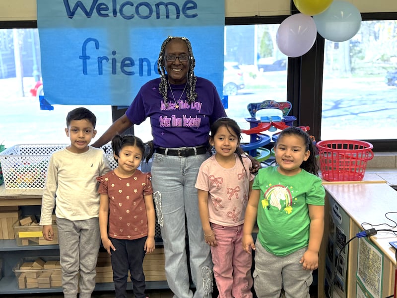 In February, Phyllis Holmes of Joliet reached 19,302 volunteer hours with the Catholic Charities, Diocese of Joliet, Foster Grandparent Program. Holmes has served in the program at the Broadway Head Start Center for 16 years and is seen with some of her students in April 2026.