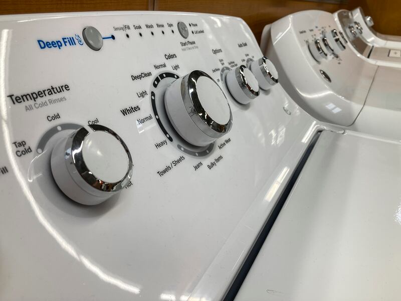 FILE - A General Electric washer sits inside a retailer, Sept. 15, 2023, in Marietta, Ga. (AP Photo/Mike Stewart, File)