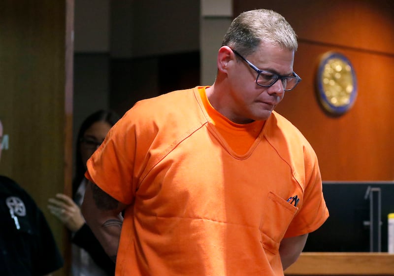 Charles Gozzola walks into a McHenry County Courtroom on Monday, April 29, 2024, for a trial in front of Judge Mark Gerhardt, The charges against Gozzola are aggravated battery in a public place, a Class 3 felony, and domestic battery with physical contact stemming from an alleged incident in Crystal Lake in January. In 2002, he was convicted of killing his then-wife and served prison time.