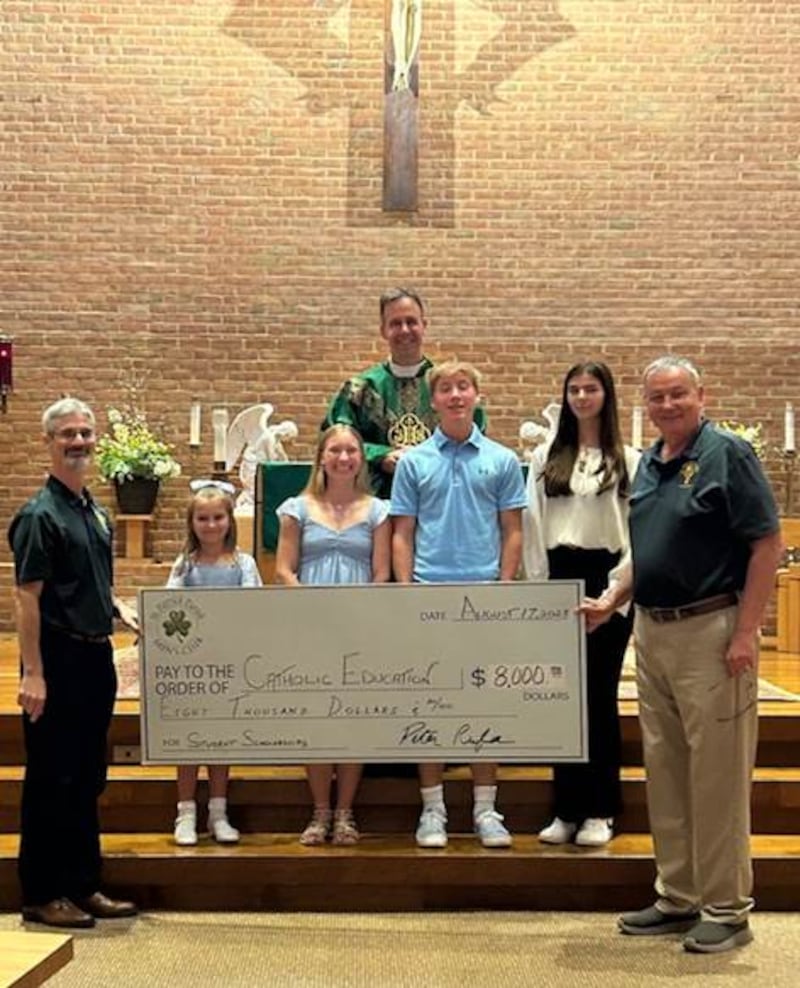 St. Patrick Men’s Club in Yorkville presented scholarships to parish families for Catholic School Education. Pictured, Peter Rufa, president of St. Patrick Men's Club, recipient Olivia Kampf, recipient Eva Rowe, Father Jim McCormack, recipient Samuel Rowe, recipient Samantha Reynolds, Mike Pfieffer, secretary and scholarship chairman of St. Patrick Men’s Club. Not pictured, recipient Caroline Kavulich.