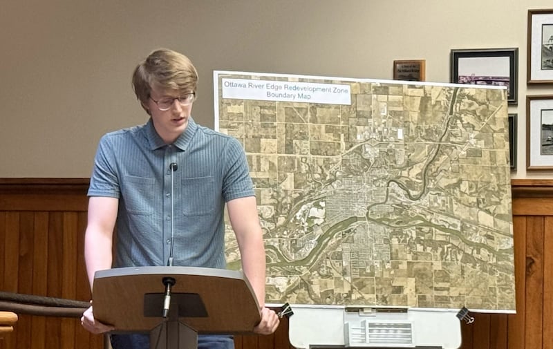 North Central Illinois Council of Governments Community Planner Calvin Croy explains the River Edge Redevelopment Zone during a public hearing Tuesday at Ottawa City Council. The zone, if approved, will enable the city to offer tax incentives and other tools to attract investment and support local businesses.