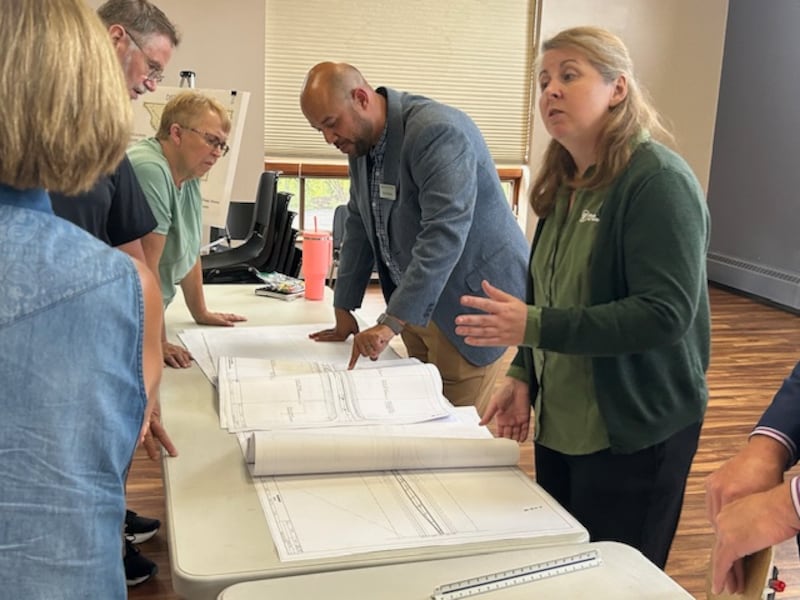 Faith Duncan (right) of the Illinois Department of Transportation explains the proposed U.S. 30 enhancement project to Morrison residents Wednesday, July 16, 2025, at Odell Public Library.