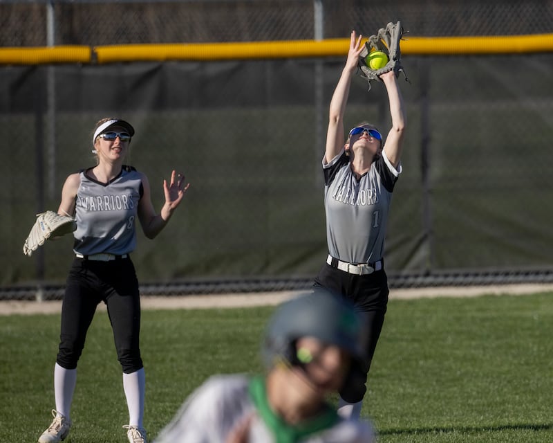 Woodland/Flanagan-Cornell shortstop Olivia Chismarick (1) retreats into shallow left field to make the catch during a 2024 matchup with Seneca.