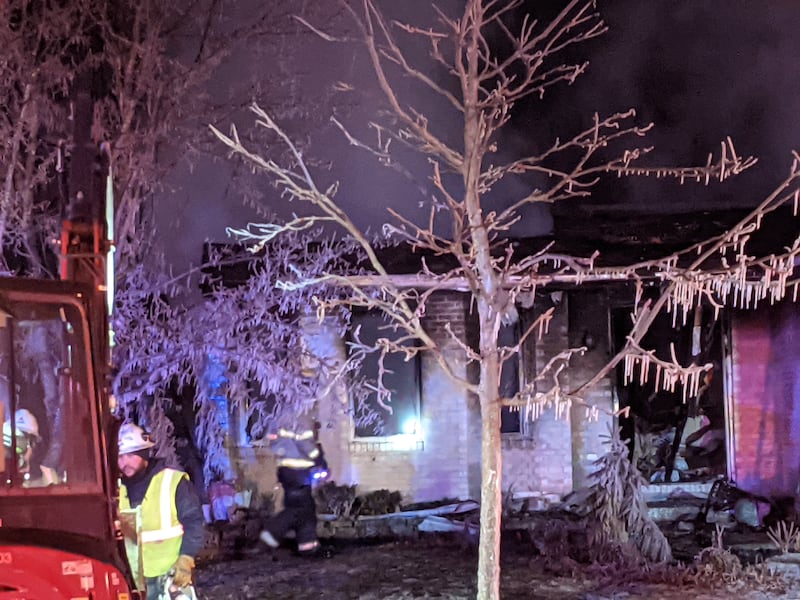 Firefighters respond to a house explosion in the 200 block of Fox Chase North in Oswego on Thursday, Jan. 29, 2026.