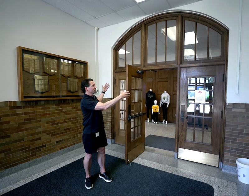 Steve Wilder, superintendent of Sycamore School District 427, talks Tuesday, June 18, 2025, about the entryway of the former Central School in Sycamore. The nearly century old building currently houses the district offices but will soon be for sale. The district is hosting an open house at the building Saturday, June 21.