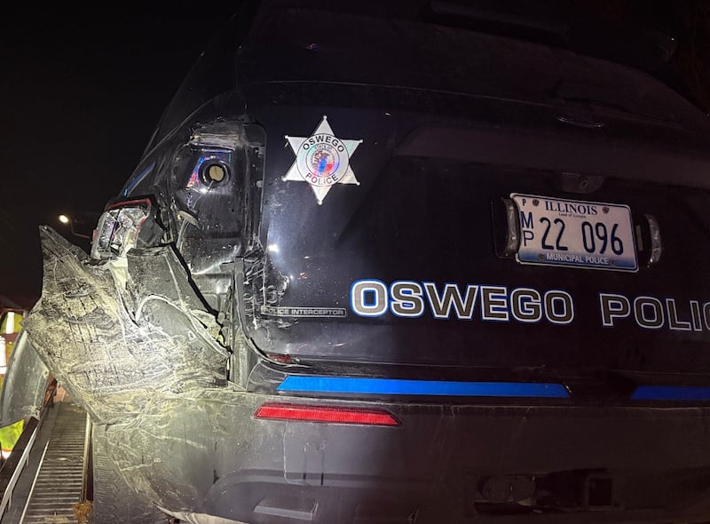 A Romeoville man who crashed into two Oswego police cars early Monday while officers were conducting a traffic stop has been charged with driving under the influence of alcohol.