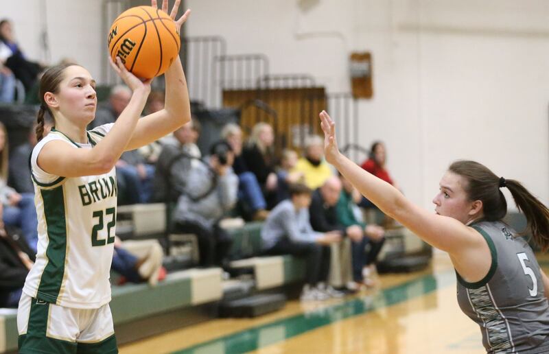 St. Bede's Hannah Heiberger shoots a jump shot over Midland's Ella Foster on Thursday, Dec. 4, 2025 at St. Bede Academy.