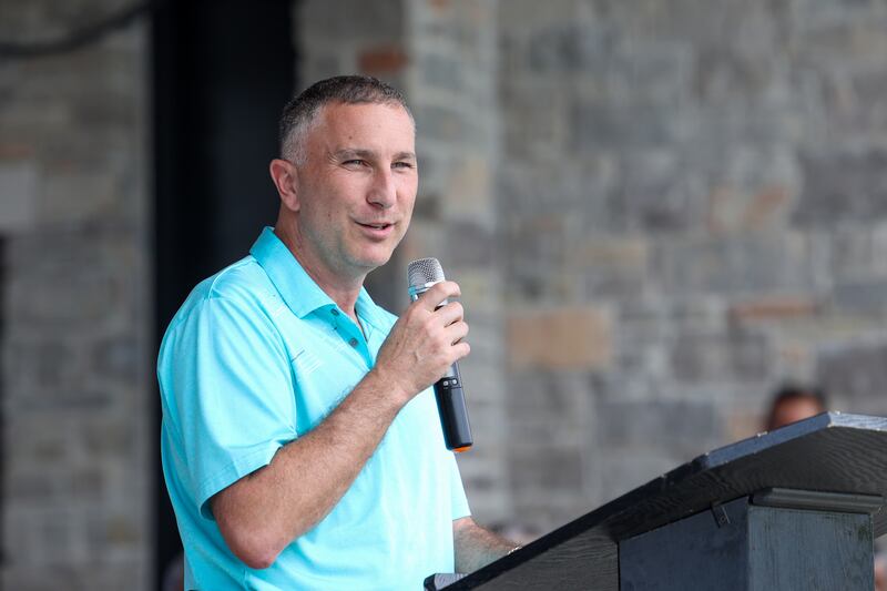 Bourbonnais Mayor Jeff Keast speaks during the opening ceremony for the Relay for Life of Kankakee County on June 14, 2025, at The Grove in Bourbonnais.