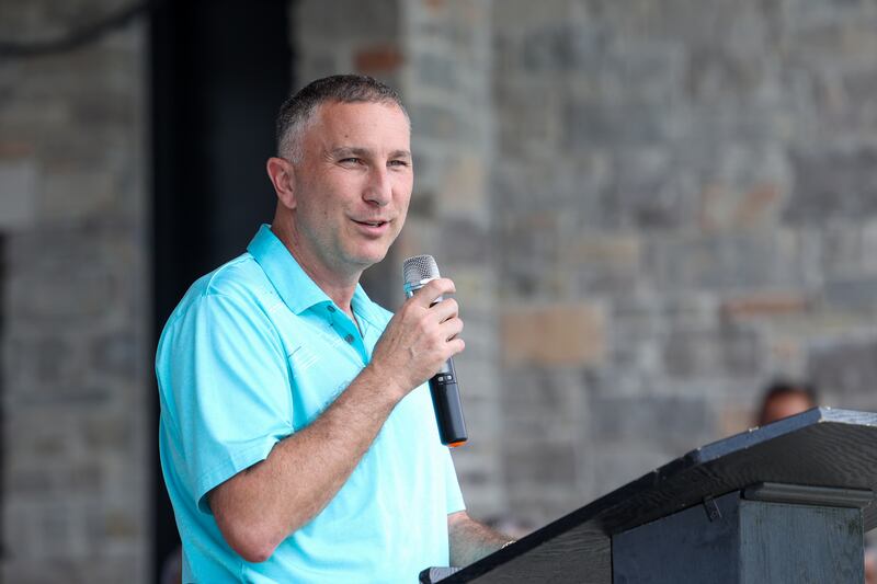 Bourbonnais Mayor Jeff Keast speaks during the opening ceremony for the Relay for Life of Kankakee County on June 14, 2025, at The Grove in Bourbonnais.