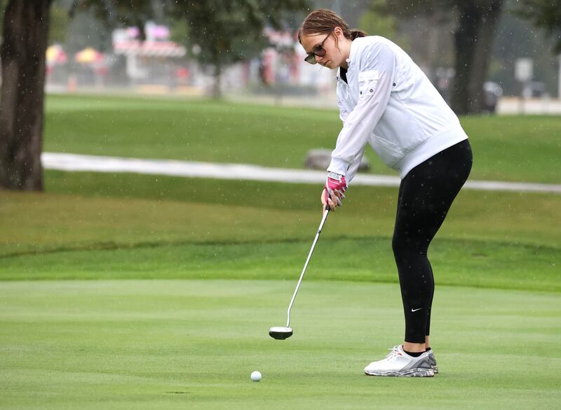 Sycamore DeKalb co-op’s Taya Johnson putts on the second green Tuesday, Sept. 24, 2024, during the Interstate 8 girls golf tournament at the Sycamore Golf Club.