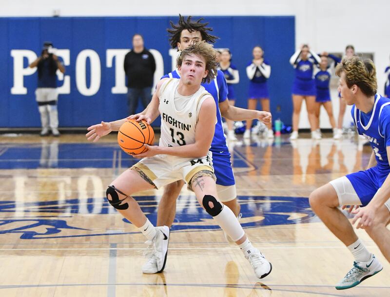 Bishop McNamara's Trey Provost and Bismarck-Henning's Kelson Peoples feet collide as Provost looks to tie the game with a 3-ponter in the final seconds of the Fightin' Irish's 52-49 loss in the IHSA Class 2A Peotone Sectional championship on Friday, March 7, 2025. The collision was ruled unintentional and the game ended in the Blue Devils' favor.