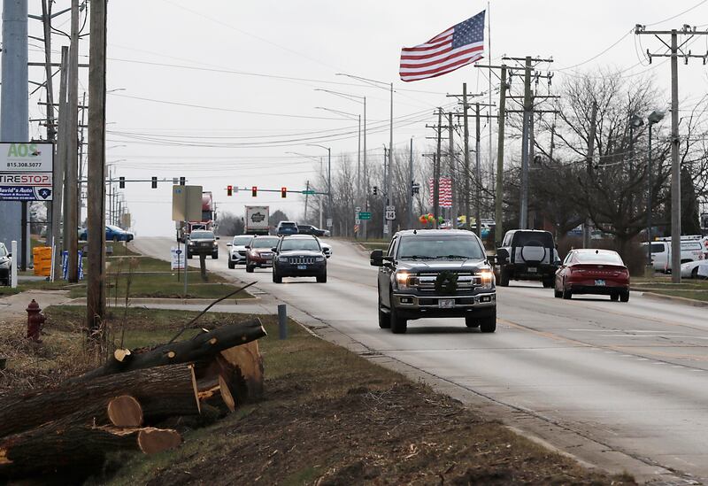 Logs are piled alongside Route 47 on Wednesday, Dec. 11, 2024, in Woodstock as tree removal continues in preparation for the Route 47 construction project.