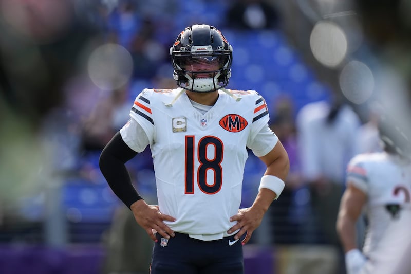 Chicago Bears quarterback Caleb Williams (18) warms up before an NFL football game against the Baltimore Ravens, Sunday, Oct. 26, 2025, in Baltimore. (AP Photo/Stephanie Scarbrough)