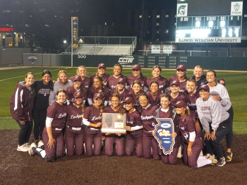 The Lockport softball team poses with the Class 4A Illinois Wesleyan Supersectional plaque after punching their ticked to state with a 2-0 win over Bradley-Bourbonnais on June 9, 2025.
