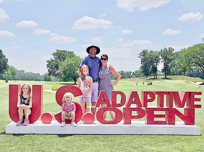 Justin "Tank" Van Landuit had his team with daughers Raynor (from left), Ryker and Rourke and his wife, Erin, to play in the U.S. Adaptive Open for golfers with disabilities at Woodmont Country Club in Rockville, Md.