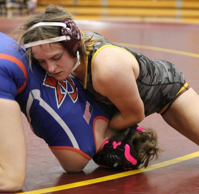 Richmond-Burton's Madelyn Peterie wrestles an opponent from Genoa-Kingston during varsity action earlier this season.