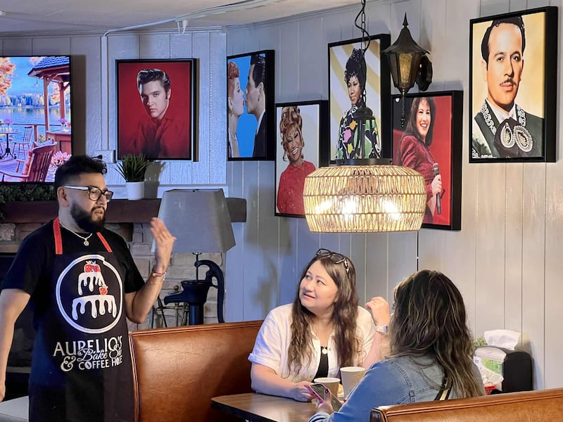 Owner Aurelio Gallardo talks with customers during the grand opening of Aurelio's Cake Factory Bistro & Cafe on Oct. 9, 2025.