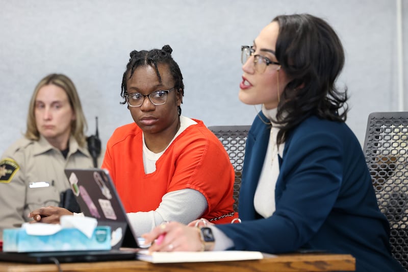 Defendant Xandria Harris, left, listens as defensive attorney Cierra Norris addresses an issue with Judge Kathy Bradshaw-Elliott during court proceedings ahead of the trial for Harris on Friday, Feb. 13, 2026.