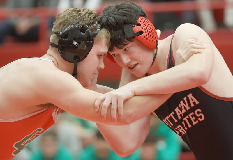 L-P's Endrew Sell, wrestles Ottawa's Vaughn Andersonduring a meet on Thursday Jan. 8, 2026 in Kingman Gymnasium at Ottawa High School.