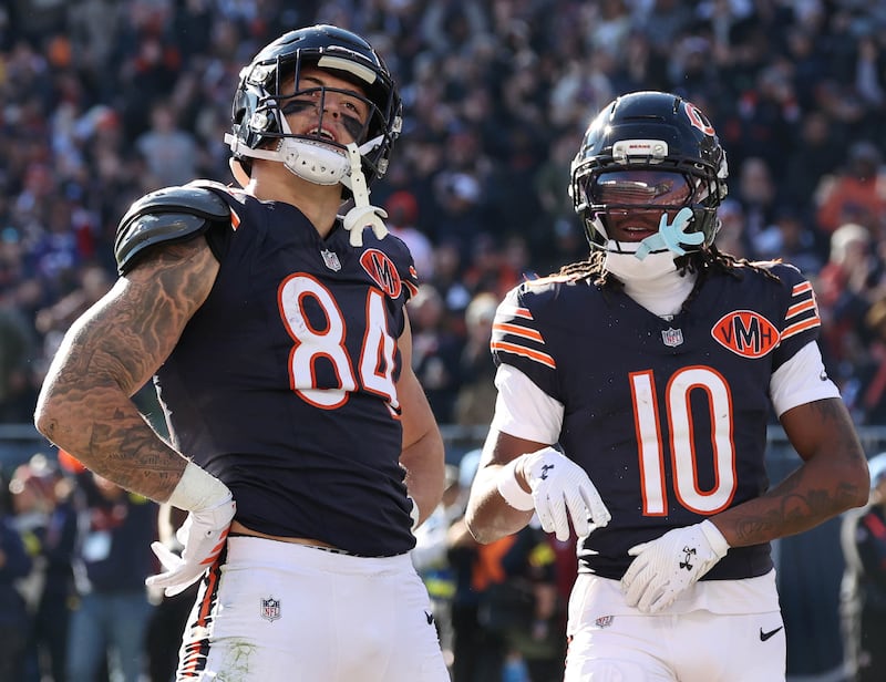 Chicago Bears tight end Colston Loveland (left) celebrates after catching a touchdown pass during their game Sunday, Nov. 23, 2025, against the Pittsburgh Steelers at Soldier Field in Chicago.