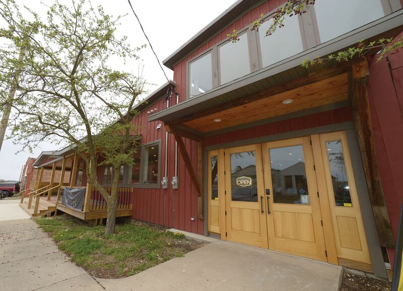 The former Graves Lumber building in Seneca was the home of a lumberyard for more than 100 years. Dave and Erin Stuedemann bought the building after it sat empty for more than a decade; now it's home to a coffee shop, home and lawn decor store, a chiropractic office, multiple business offices and social spaces.