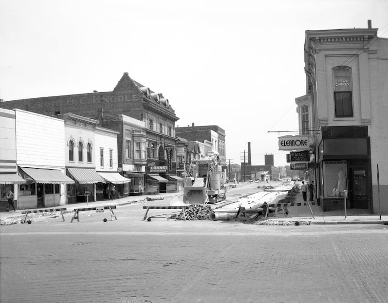 East Lincoln Highway looking east from Third Street in DeKalb during road work, May 1949.