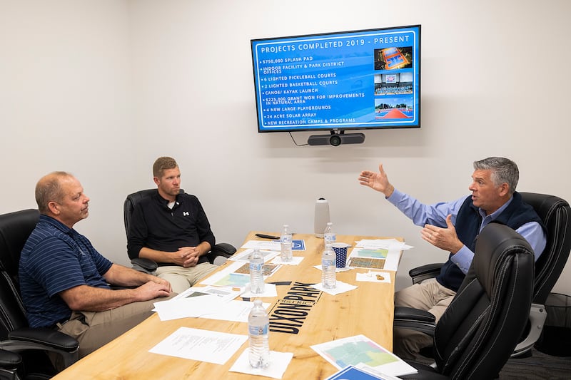 Congressman Darin LaHood (right) gestures while speaking with Dixon Park District executives Duane Long (left) and Seth Nicklaus Friday during a meeting Friday, Oct. 18, 2024, at The Facility.