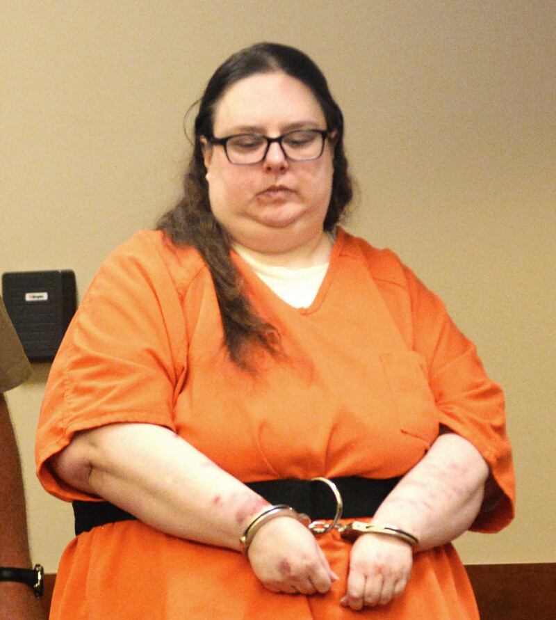 Sarah Safranek, 38, is escorted into an courtroom at the Ogle County Judicial Center on Wednesday, Sept. 17, 2025. She is accused of suffocating her 7-year-old son, Nathaniel Burton, in 2021. She has been held in the Ogle County Jail since her arrest.