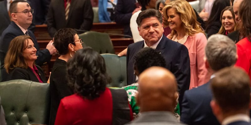 Gov. JB Pritzker enters the Illinois House chamber to give his annual budget address on Wednesday, Feb. 18 2026.