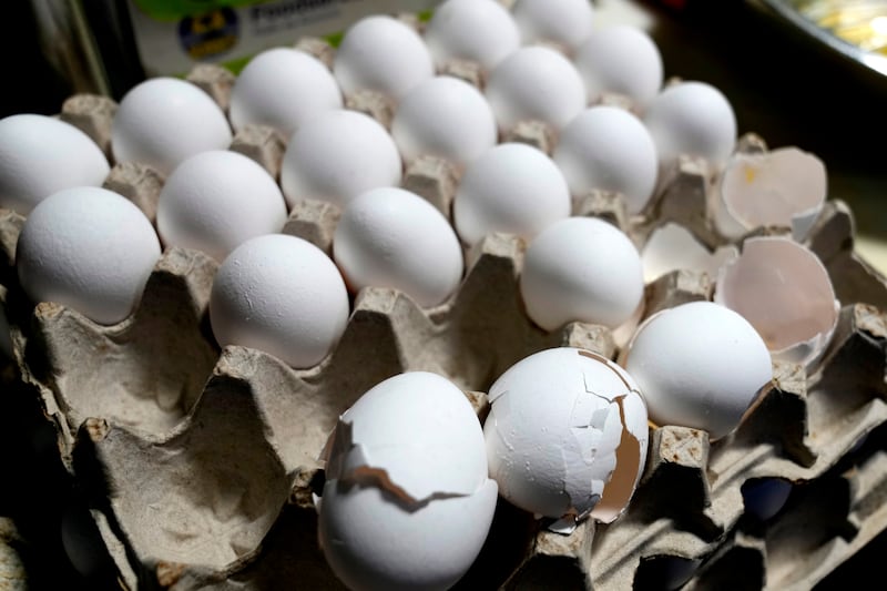 A carton of eggs sit on a counter in the kitchen inside of 5 Rabanitos restaurant in Chicago.