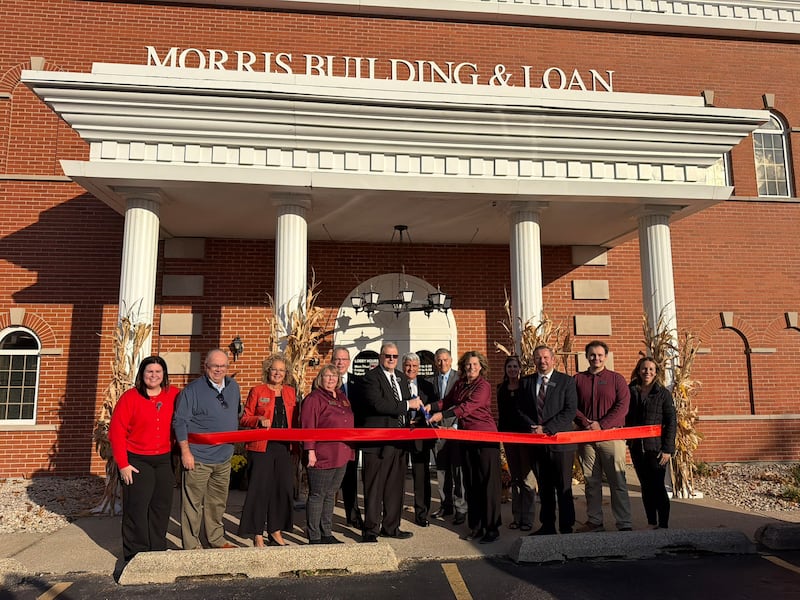 Employees of Morris Building & Loan and members of the Grundy County Chamber of Commerce at the Ribbon Cutting Ceremony.