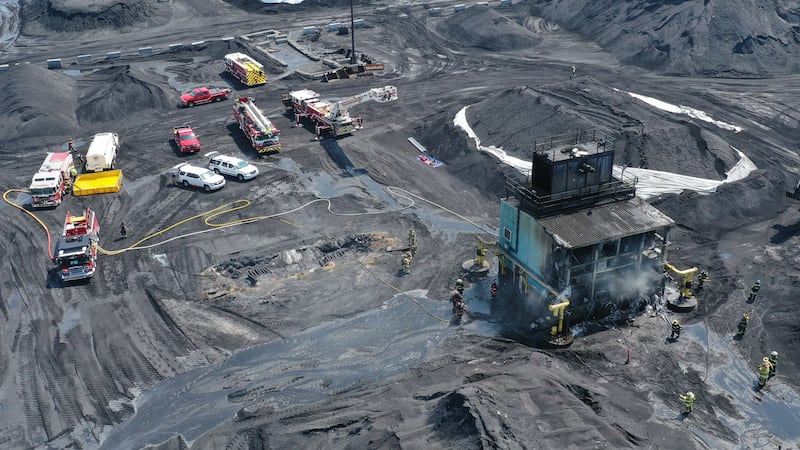 Two firefighters hospitalized after Hennepin Mill fire