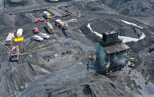 Two firefighters hospitalized after Hennepin Mill fire