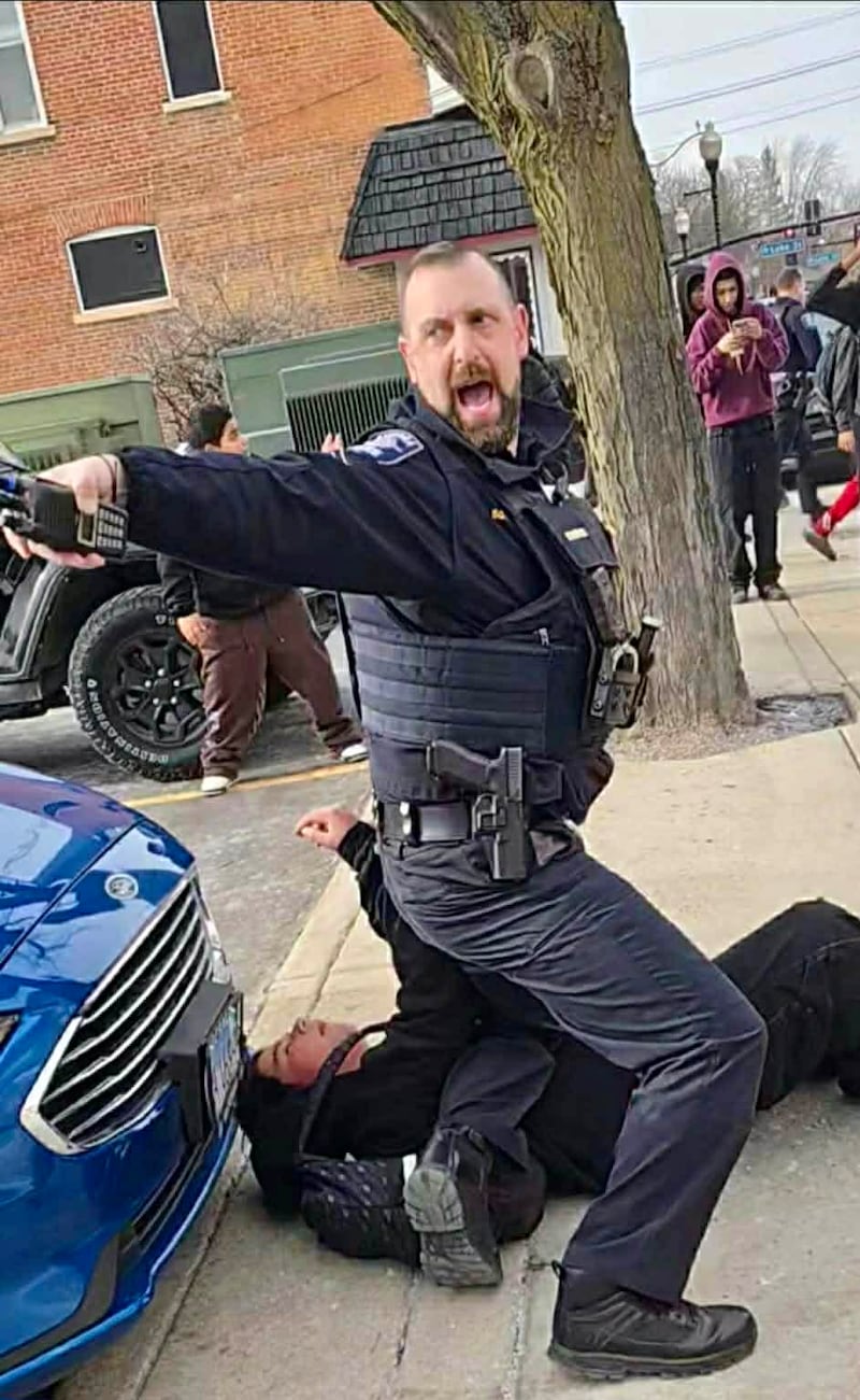 During a student-led walkout protest of federal immigration arrests, the Aurora Police Department clashed with students on Feb. 9, 2026. Three students were taken into custody. Captured video shows one officers violently tackling one of the students to the pavement.