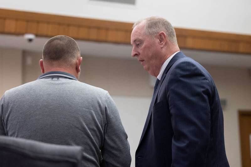 Defense attorney Joe Nack speaks with client Matthew Herpstreith on Friday, February. 20, 2026.