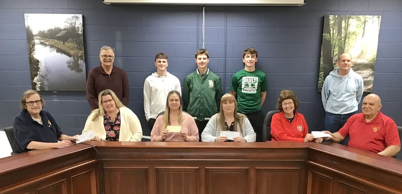 The Utica Knights of Columbus Fr. Marquette Council donated $2000 to four local charities who provide services for people with intellectual disabilities. Gathered at the check presentation are (front from left) Mike Brown, Brittany Anderson and Beth Compeotto of Starved Rock Regional Center, Jessica Kreiser, Lighted Way executive director and Jim Polizzi Grand Knight. (Back from left) Joe Bernardoni, St. Bede students; August Burr, Carson Riva, Gino Ferrari and Rick Friedrich. The Special Olympics Region A was absent for the presentation. Each organization received a total of $500. Money collected was raised through the intellectual disabilities (Tootsie Roll drive) last fall.