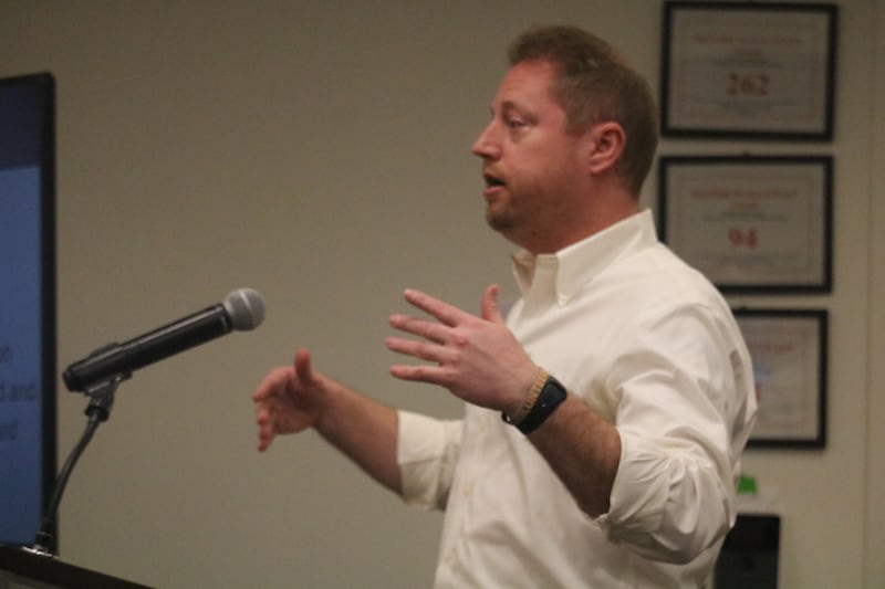 DeKalb City Engineer Zac Gill briefs the public Monday, March 24, 2025, on agenda items to be voted on during the DeKalb City Council meeting.
