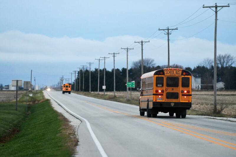 Herscher School District buses head west on Route 115 as drivers begin routes in August 2023.