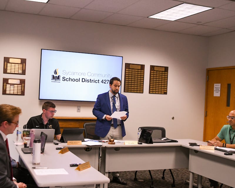 Sycamore school board president Michael DeVito II addresses the community on Friday Aug. 1, 2025, during a school board meeting that superintendent Steve Wilderhas been removed from his position held at the administration office in Sycamore.