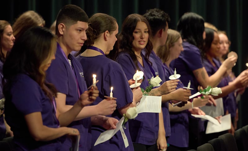 Illinois Valley Community College nursing graduates receiving nursing pins