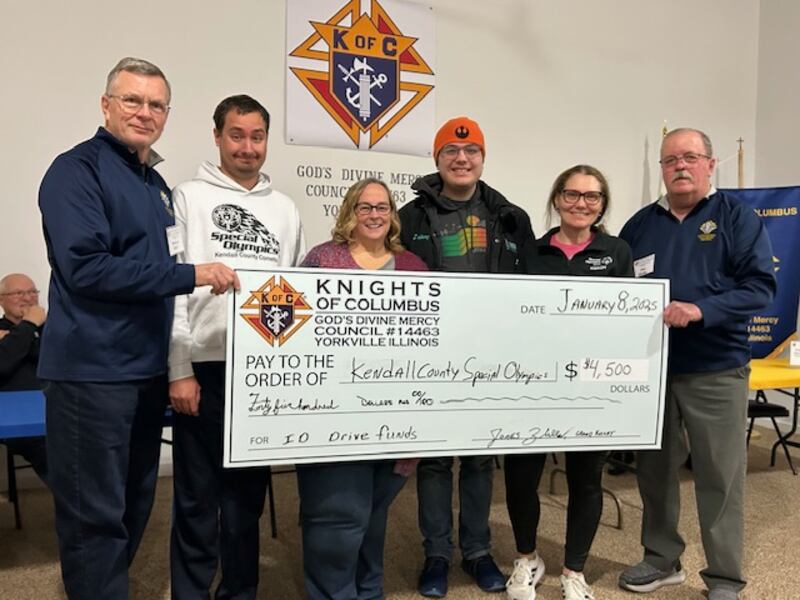 The Yorkville Knights of Columbus presented the Illinois Special Olympics of Kendall County a super-sized check worth $4,500 on Jan. 08, 2025. Pictured is Michael Gach, the Intellectual Disability Drive chairman (far left), and Jeremy and Lori Kuehn of the Kendall County Special Olympics. Of the organization is also Zachary and Lisa Hartman. Jim Zbella, Grand Knight of the Yorkville Council is pictured (far right).