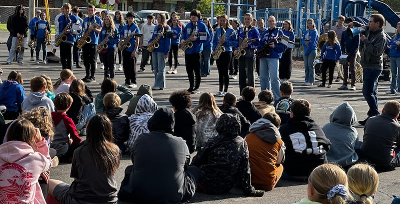 The Princeton High School marching band performing at Lincoln Elementary School