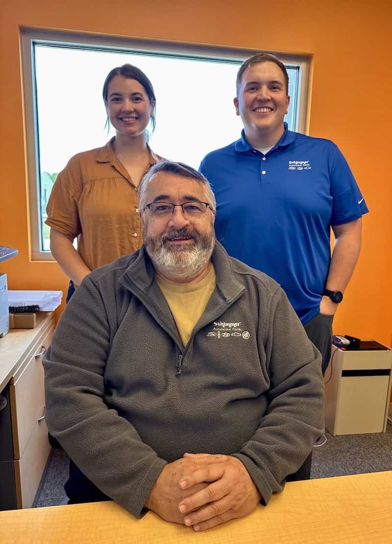 From left, Tori Schimmer, Jeff Schimmer and Dan Winterrose pose for a photo at Schimmer’s Auto in Mendota.