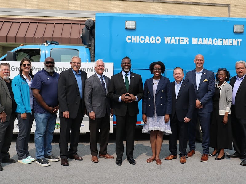 Chicago Mayor Brandon Johnson (center) joins representatives from the Grand Prairie Water Commission and Chicago Water Department on Monday to celebrate the start of construction of a 65-mile pipeline that will bring Lake Michigan water to the Joliet region. June 2, 2025